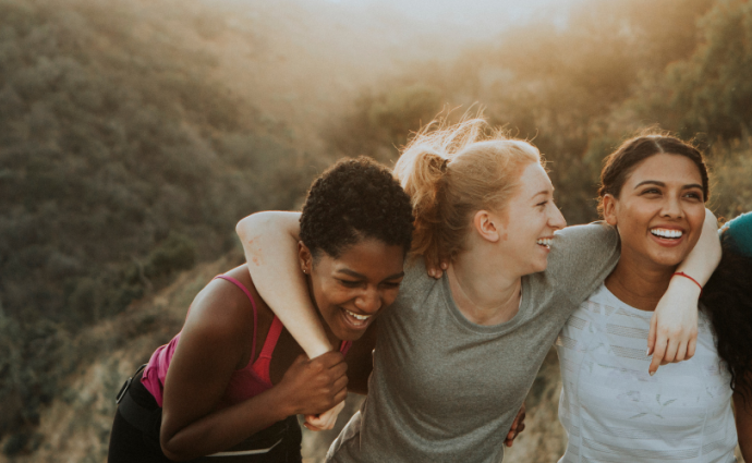 Women having fun while hiking.